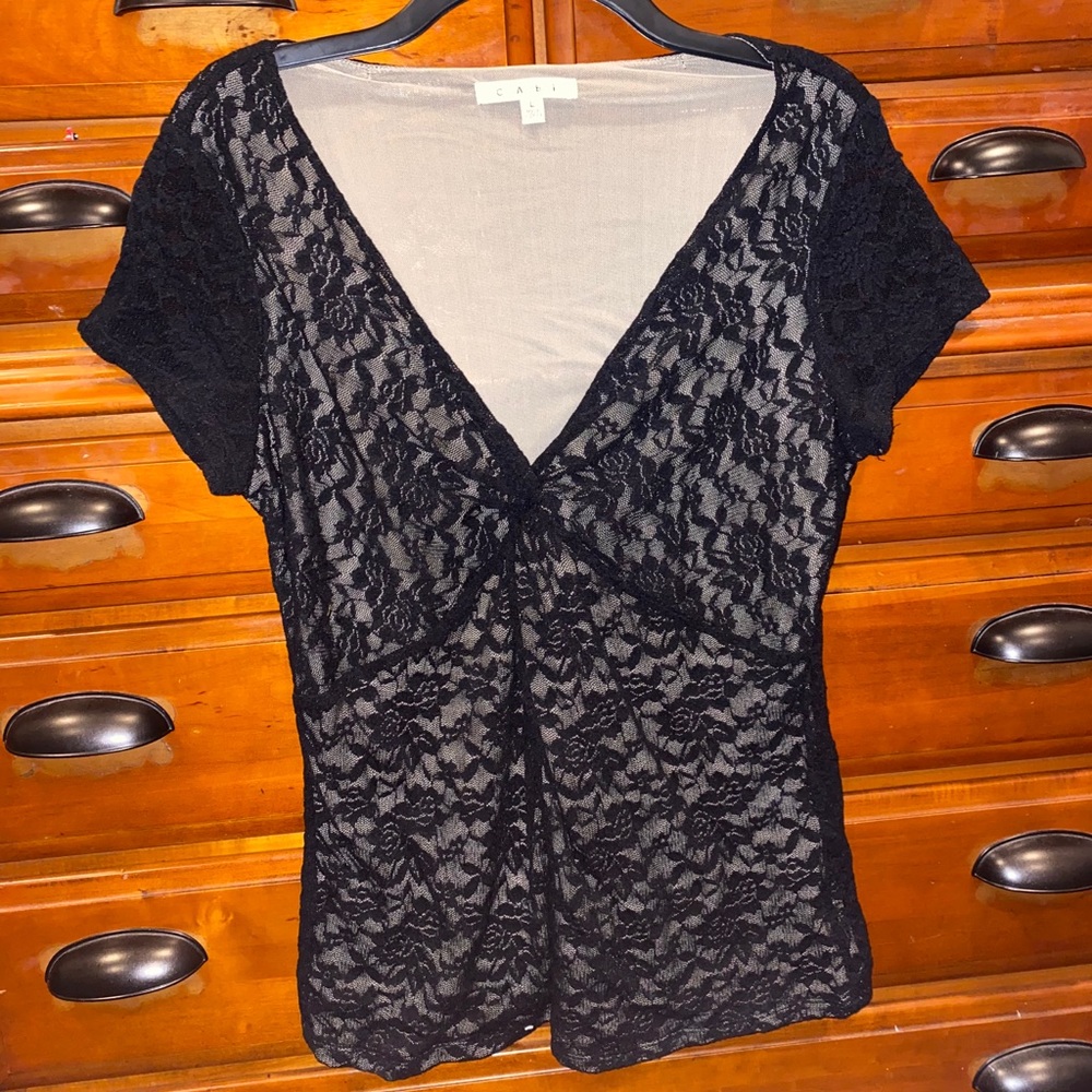 nude and black blouse w/ v-neck